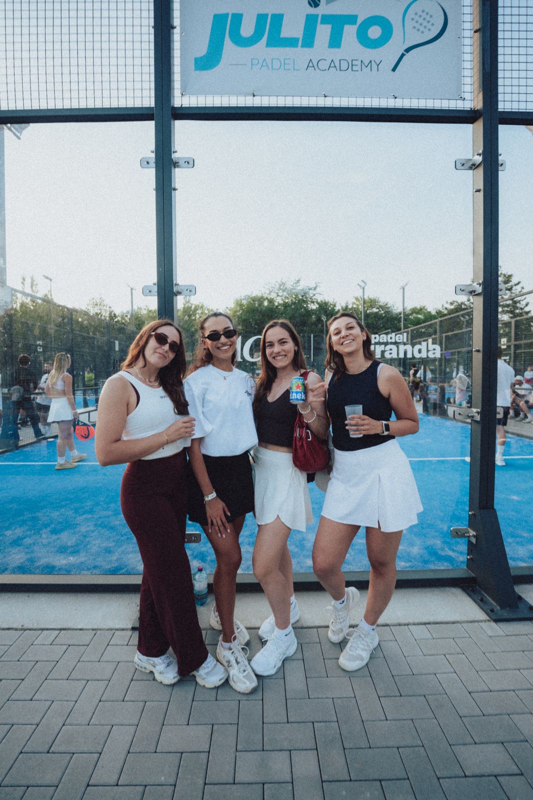Group of players in front of the Padel Parranda court sign in Frankfurt